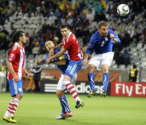  Daniele De Rossi was beaten in the air by Antolin Alcaraz of Paraguay