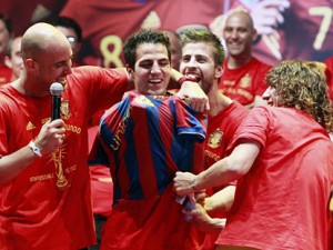 Fabregas is forced to don a Barca shirt