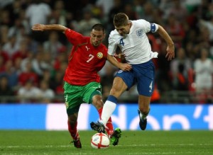 Steven Gerrard and Ivelin Popov