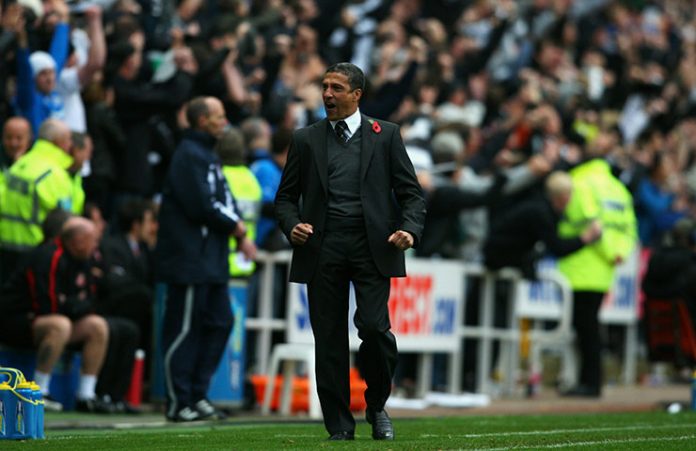 Chris Hughton celebrates