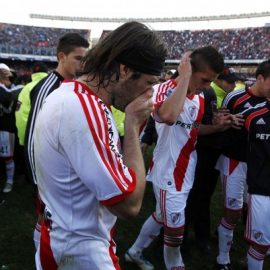 River Plate's Pavone reacts next to teammates at the end of their Argentine First Division playoff soccer match against Belgrano in Buenos Aires
