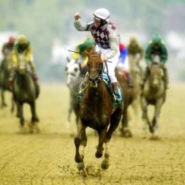 JOCKEY JOSE SANTOS CELEBRATES AFTER WINNING PREAKNESS STAKES