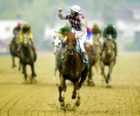 JOCKEY JOSE SANTOS CELEBRATES AFTER WINNING PREAKNESS STAKES