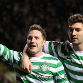 Kris Commons celebrates winning against Benfica