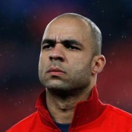 hi-res-163393614-alex-of-psg-looks-on-prior-to-the-round-of-16-uefa_crop_north