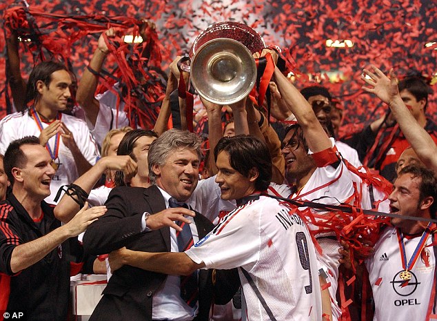 Ancelotti hugs Filippo Inzaghi as he win his first managerial Champions League
