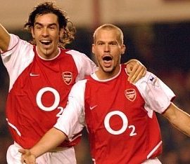 ARSENAL V SPURS.LUNDBERG CELEBRATES WINNER WITH PIRES.PIC DAVE SHOPLAND