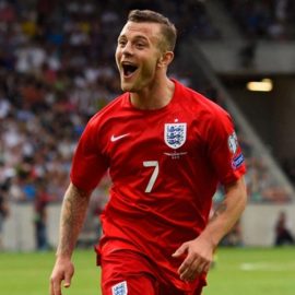 Jack Wilshere celebrates scoring against Slovenia