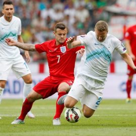 Jack Wilshere in action with Ales Mertelj