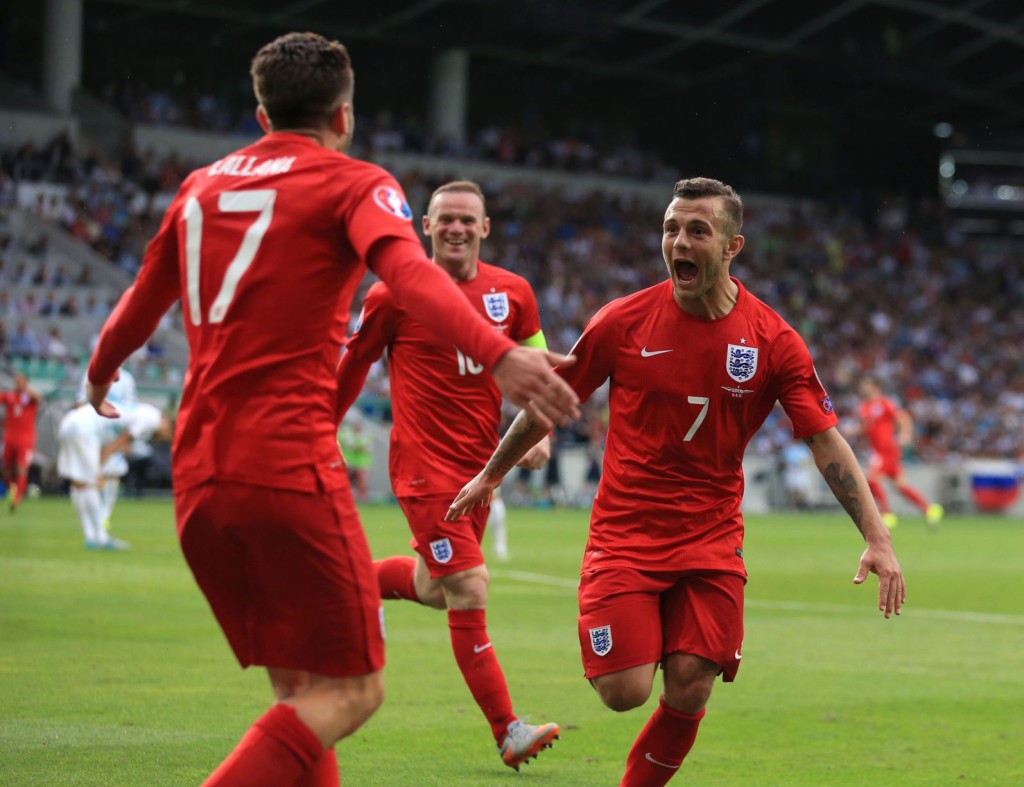 Jack Wilshere celebrates scoring his and England's second goal in yesterday's 3-2 victory over Slovenia.