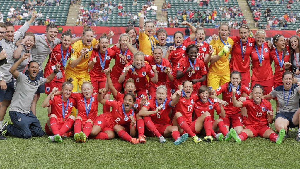 England's women—known as the lionesses—celebrate with their third-place medals, following their historic victory over Germany.