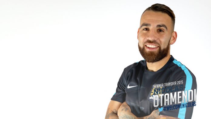 Nicolas Otamendi of Valencia signs for Manchester City