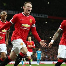 Rooney celebrating with team