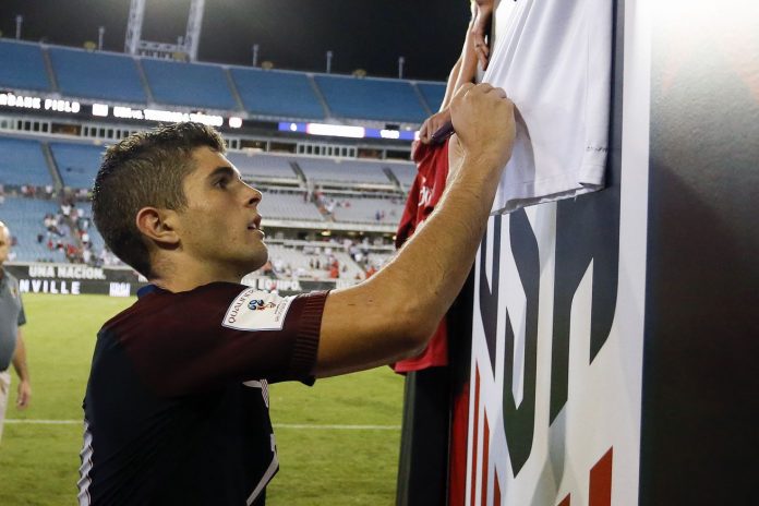 Pulisic Signs Autographs