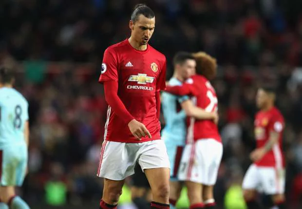 Zlatan Ibrahimovic walks off, dejected after Man Utd fail to beat Burnley at home.