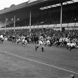 Players-sprint-from-the-Villa-Park-pitch-to-escape-the-crowd-trouble-during-Aston-Villas-abandoned-match-against-Rangers