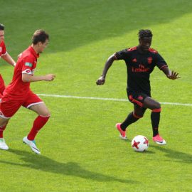 mesaque-dju-of-sport-lisboa-e-benfica-is-pursued-by-the-mainz-defence-picture-id687748260