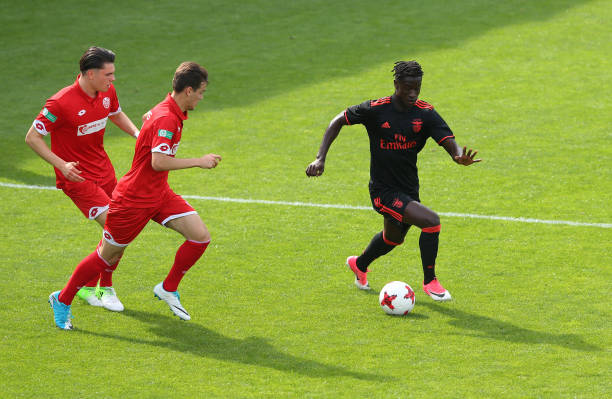 mesaque-dju-of-sport-lisboa-e-benfica-is-pursued-by-the-mainz-defence-picture-id687748260