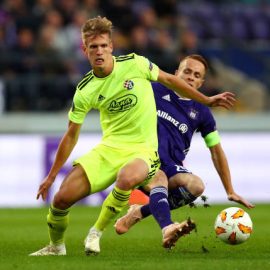 adrien-trebel-of-rsc-anderlecht-tackles-dani-olmo-of-dinamo-zagreb-picture-id1045619638