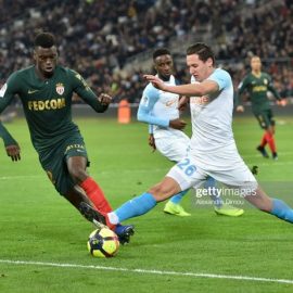 benoit-badiashile-of-monaco-and-florian-thauvin-of-marseille-during-picture-id1081998764