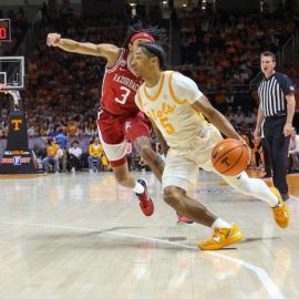 Tennessee's Zakai Ziegler drives the lane against Arkansas