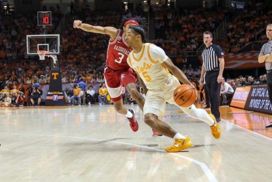 Tennessee's Zakai Ziegler drives the lane against Arkansas