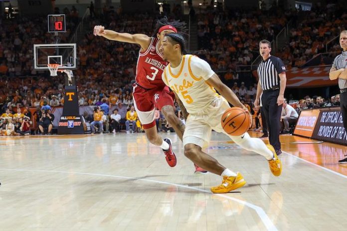 Tennessee's Zakai Ziegler drives the lane against Arkansas